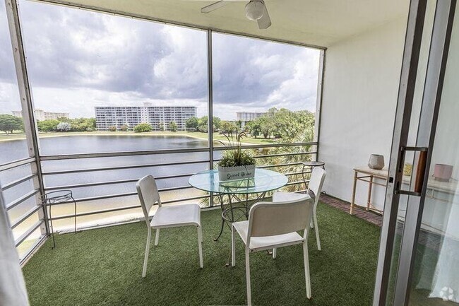 Building Photo - 2751 N Palm Aire Dr Unit 406 Rental