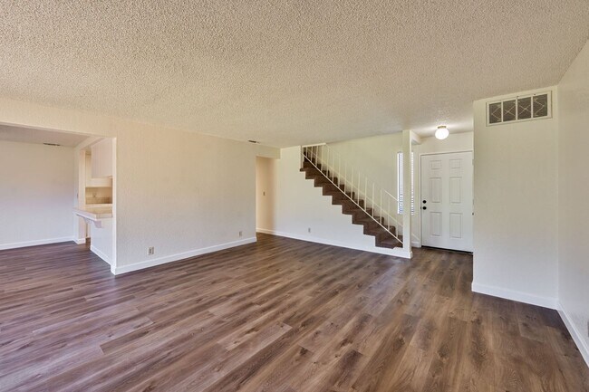 Photo - 3 Bedroom Home with Fireplace and LVP Flooring & 2-Car Garage!