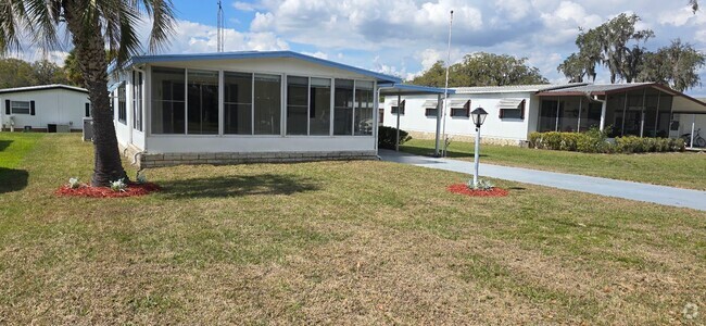 Building Photo - 2 bed 2 baths with carport Rental