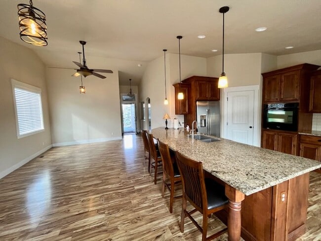 Photo - THREE-CAR GARAGE! This charming home offers 3 bedrooms, plus an office/rec room, and 2 bathrooms.