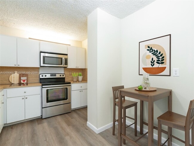 Photo - 6450 Collins Ave Unit 406
