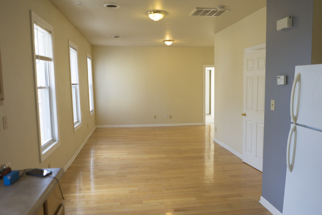 Looking to living room from kitchen - 724 E Center St Townhome