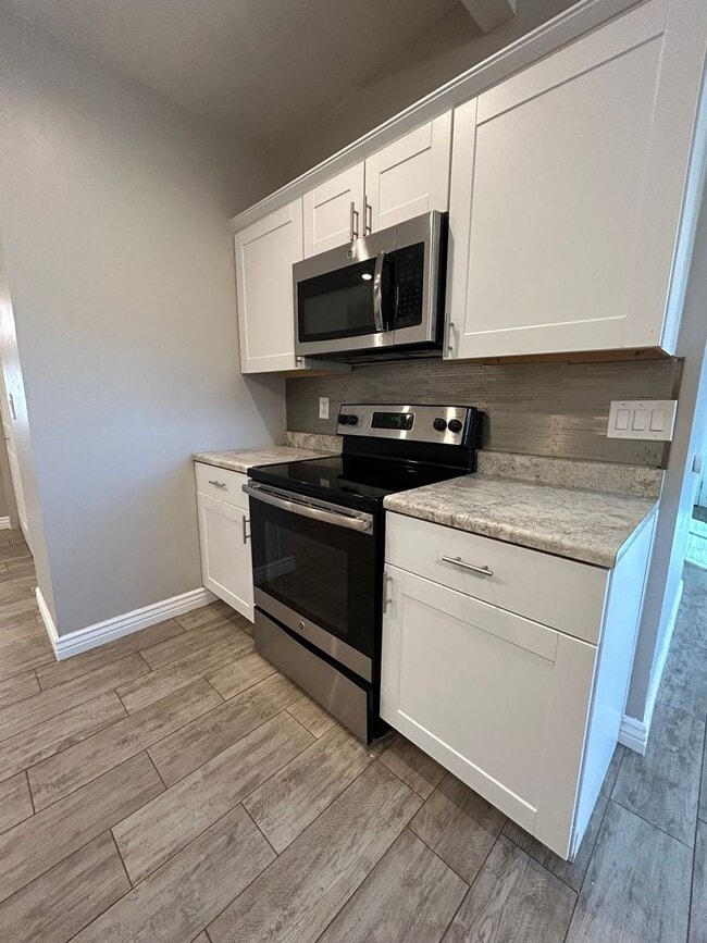 Photo - Beautiful and Spacious 4 bedroom 2 bath on a Corner Lot!