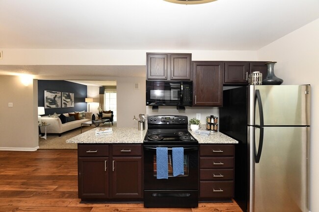 Kitchen with granite counters and modern cabinetry