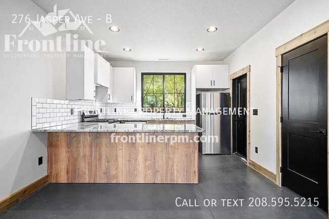 Photo - 276 Jasper Ave