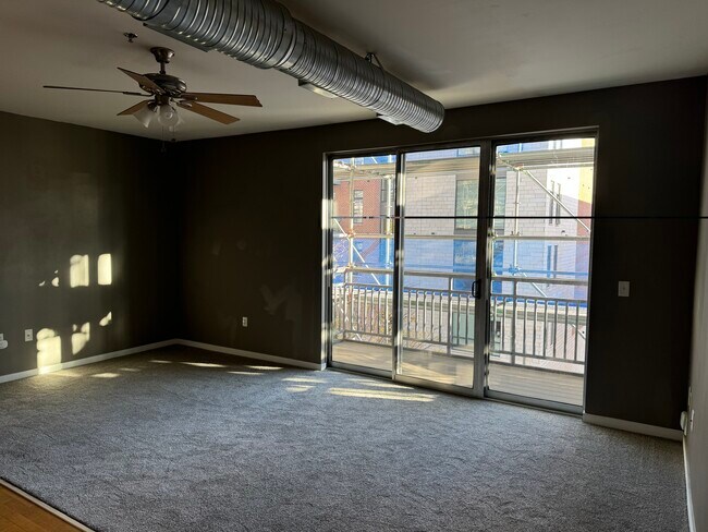 The condo doesn’t have scaffolding up anymore - 2080 N Commerce St Unit 206