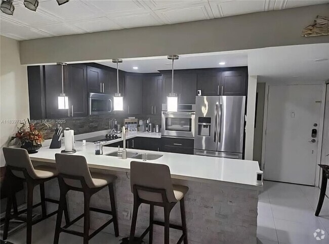 Building Photo - 404 NW 68th Ave Unit 216 Rental