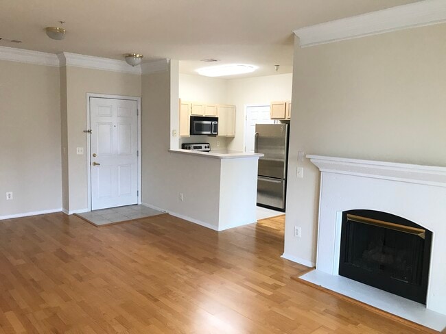 View from Living Room to Front Door - 1581 Spring Gate Dr Unit 5310