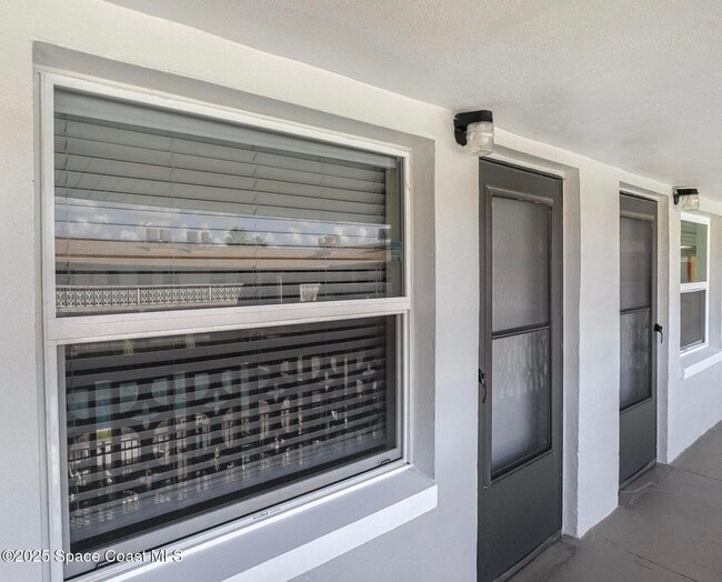 Building Photo - 5600 N Banana River Blvd Unit 48