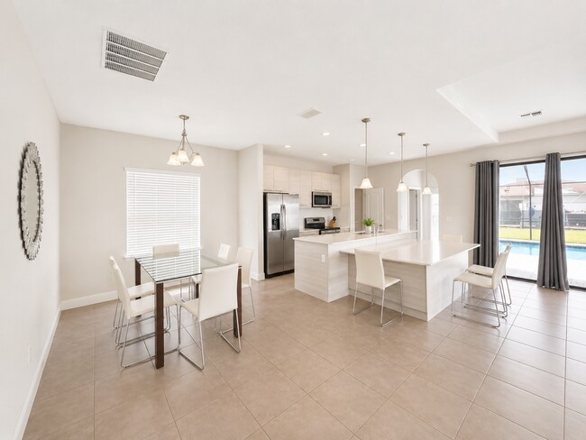 Photo - Expansive 6-Bed, 6.5-Bath on Angela's Avenue – Your Perfect Haines City Haven!