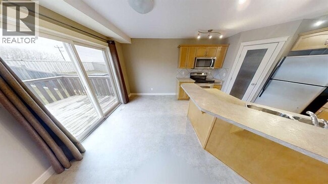 Photo - 9062-9131 131 Ave
