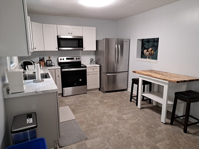 Current kitchen - 11044 Watson Dr Townhome
