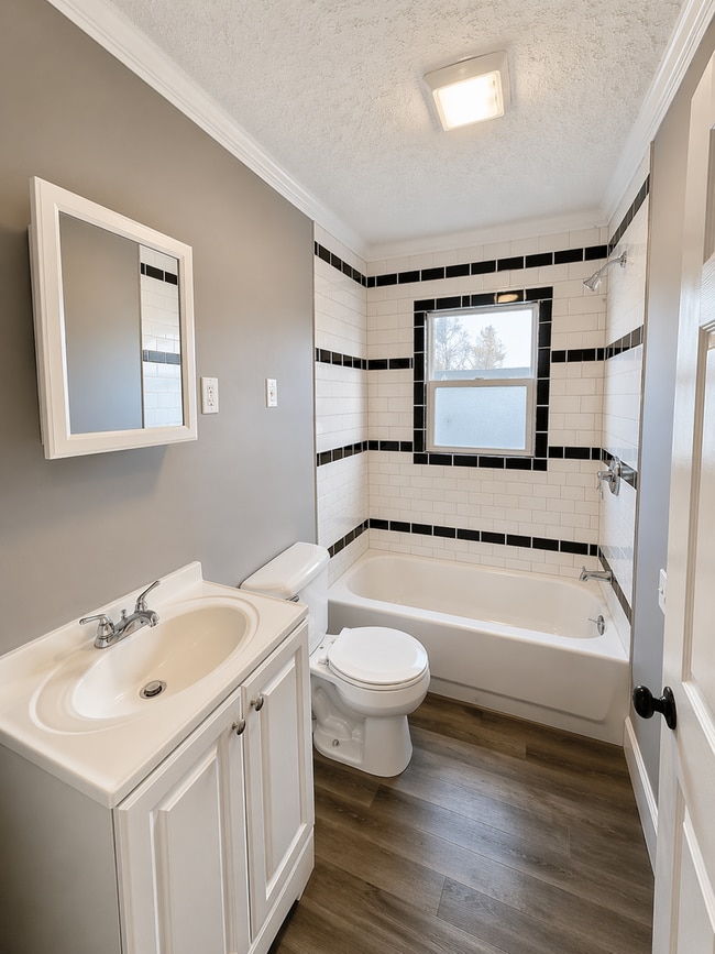 Photo - Updated 2BR Home with Finished Basement and 2-Car Garage