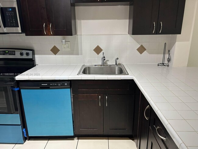 Building Photo - 7901 S Colony Cir Unit 210