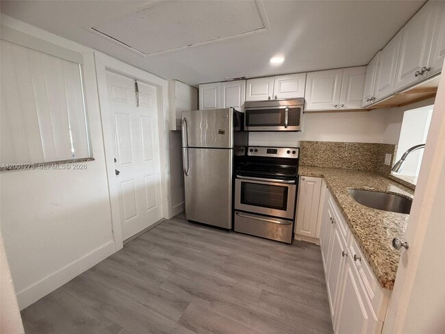 Building Photo - 20111 NE 27th Ct Unit K102