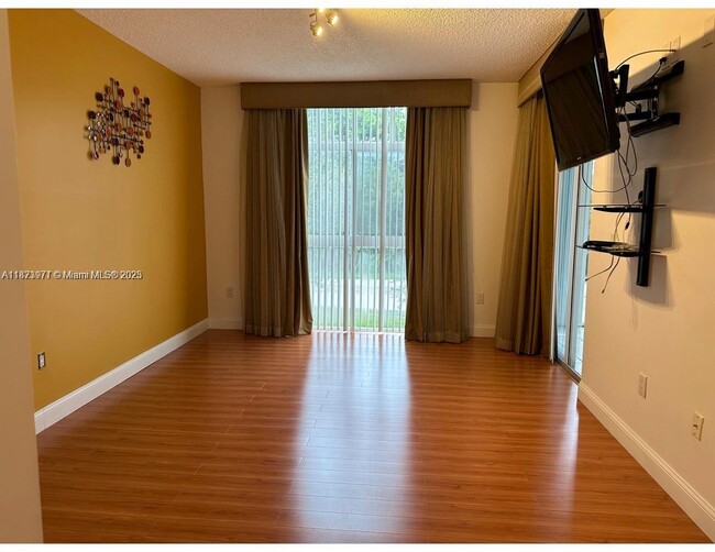 Building Photo - 9725 NW 52nd St Unit 211 Rental