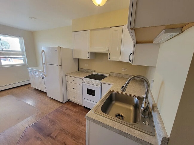 Building Photo - 6151 W Belmont Ave Rental