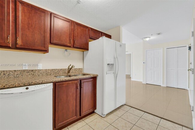 5271 SW 8th St Unit 203