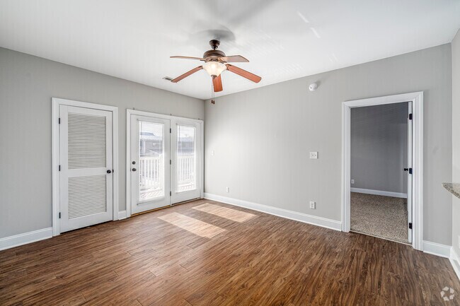 3BR, 2BA - 1,150SF - Living Room - Cornerstone Columns