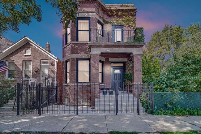 Building Photo - 3402 S Bell Ave Unit 2