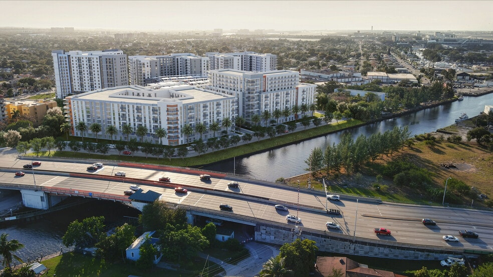 Elegant riverside apartment community with modern architecture, lush greenery, and convenient location, offering serene urban living.