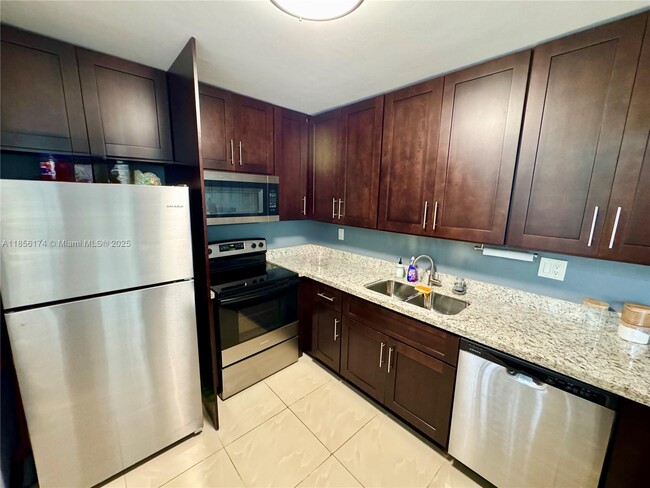 Building Photo - 9495 Evergreen Pl Unit 101 Rental
