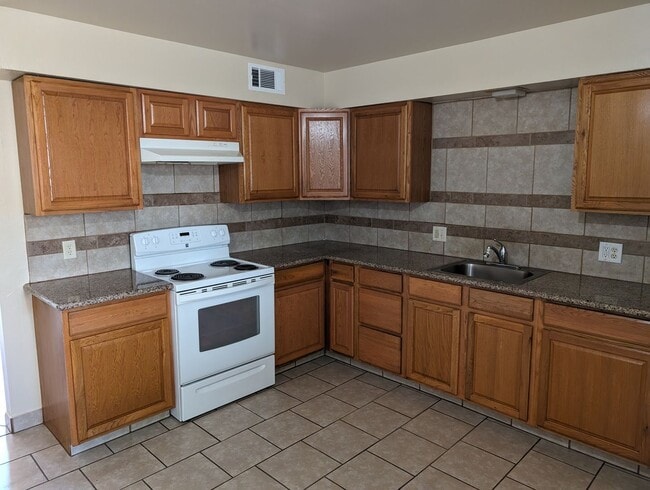 Photo - University Triplex Unit University #B-875