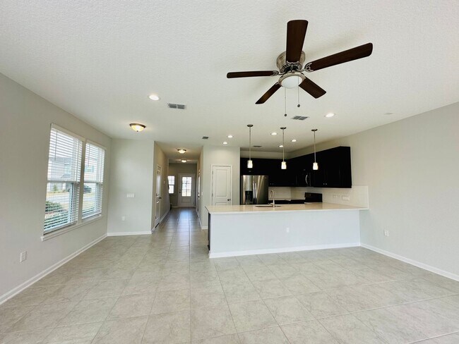 Photo - Spacious End Unit with Garage & Loft. Community features High End Amenities!