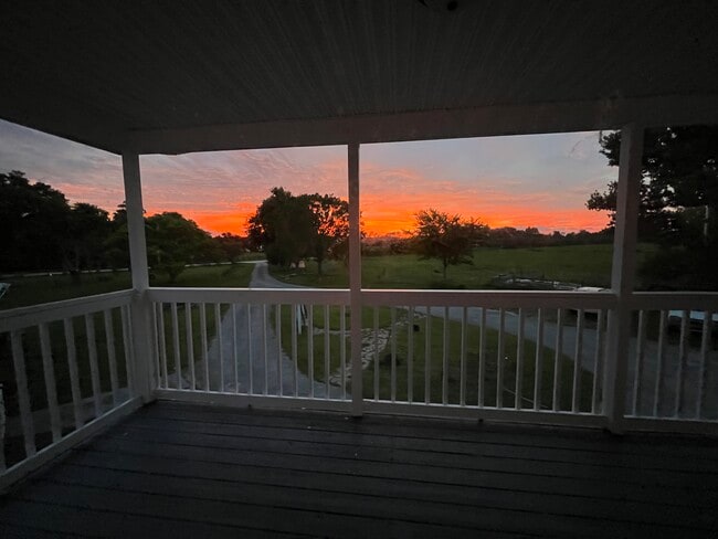 Front porch view at sunset - 501 Leeway Trl Apartments