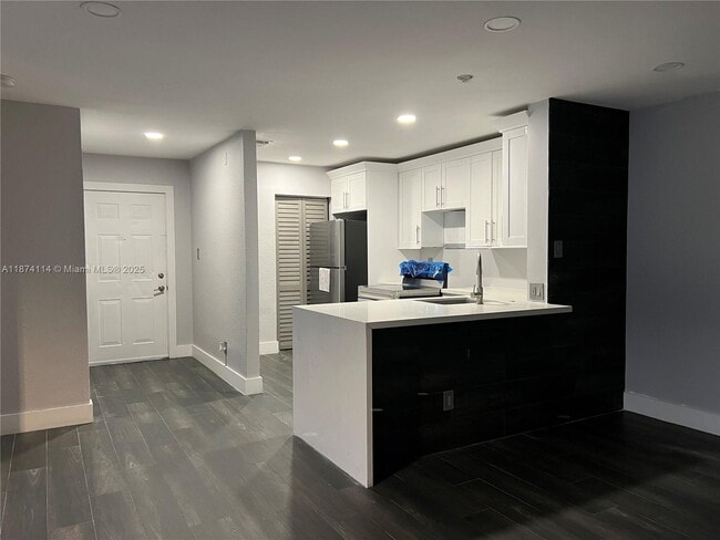 Building Photo - 11233 W Atlantic Blvd Unit 102 Rental
