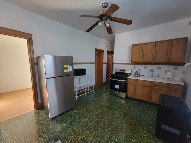 Kitchen - 3046 N Haussen Ct Apartments Unit 2R