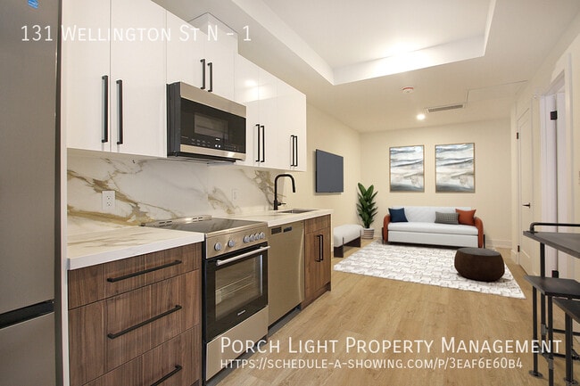 Building Photo - Completely New - Luxury Finishes - Modern Comfort Unit 1