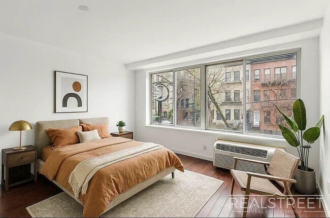Photo - 2 Bed Home with large Living Space – Laundry, Roof Decks, Pet Friendly Unit 4A
