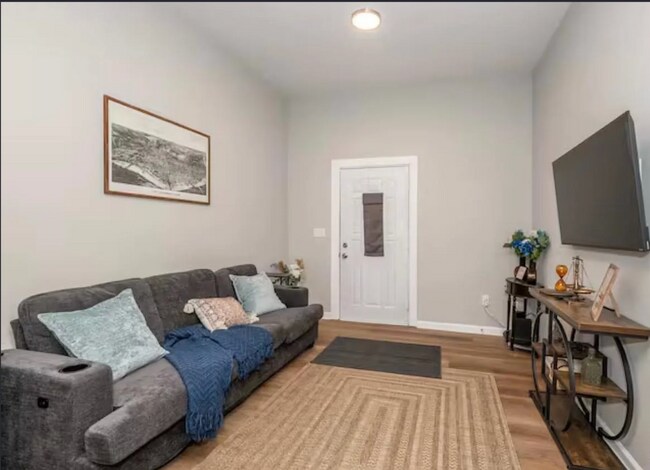 Photo - Spacious 5-Bed Furnished Home Near Xavier | Modern Updates, In-Unit Laundry & Off-Street Parking Unit 1