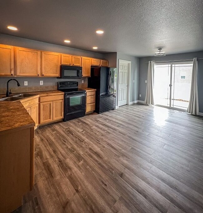 Photo - Spacious 3-Bedroom Home with Fenced Yard in Wellington – Available August 4th