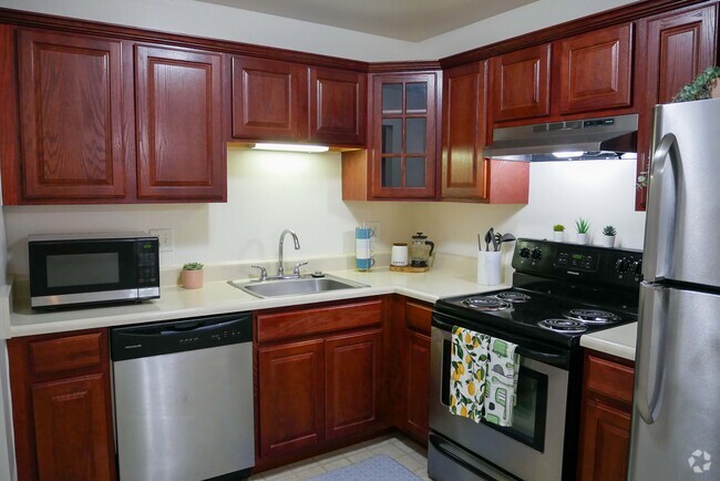 Kitchen - Cherry Style Cabinet - Meadowbrook Village Rental