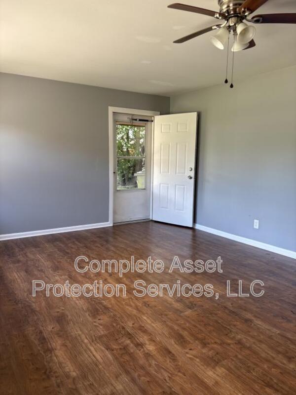 Photo - 910 W 56th Ave