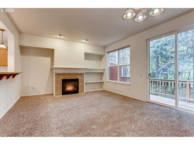 Photo - Forest-View Three-Level Townhome with Ensuite Bedrooms, Attached Garage & Fenced Yard