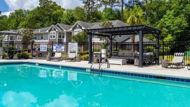 Cool off in our refreshing pool or under the shade of our poolside pergola. - The Grays at Old Town