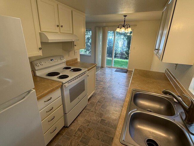 Kitchen looking towards dining area - 9127 Meridian Pl NE Unit 2