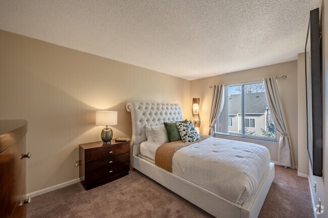 2BR, 1.5BA - 1,100SF - Primary Bedroom
