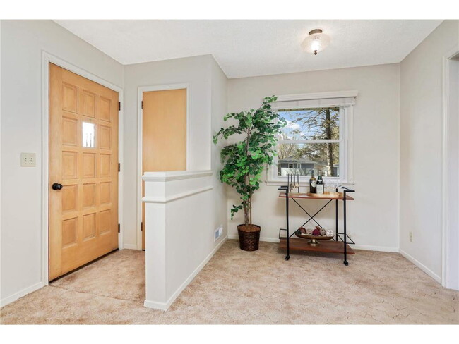 Photo - Spacious 4BR Home in Brooklyn Park – Huge Basement & New Appliances!