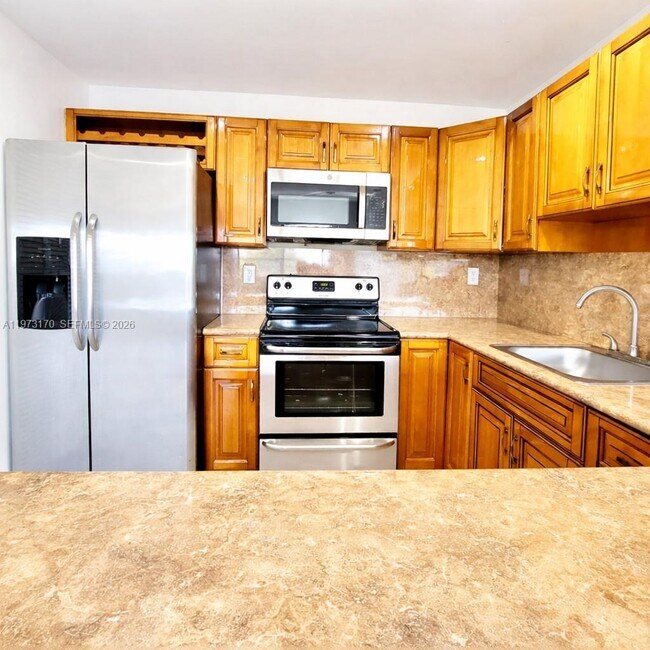 Building Photo - 13271 SW 17th Ln Unit 6-25