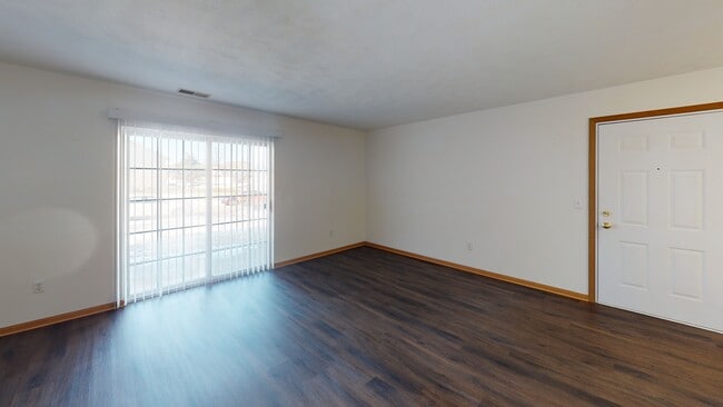 Patio door/ Living room - Rock Valley Apartments