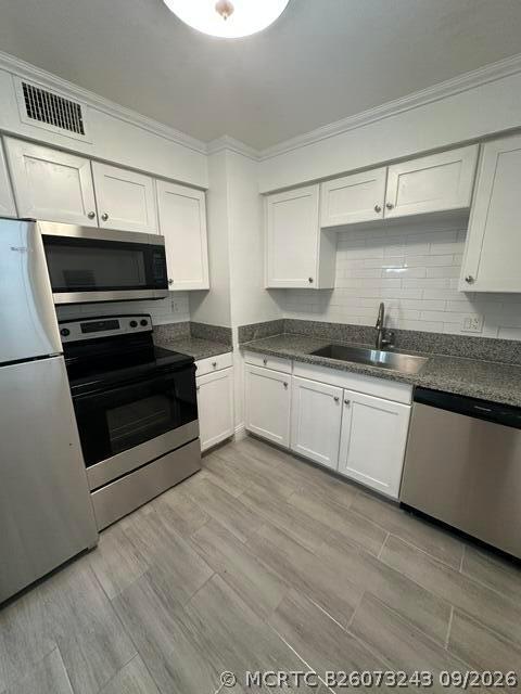Building Photo - 6505 Winfield Blvd Unit B-29