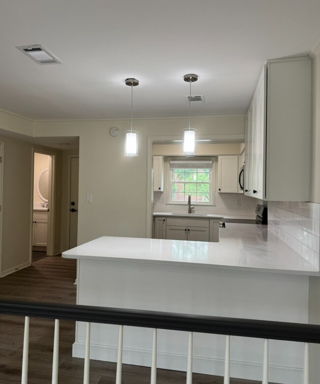 1/2 bath located off the kitchen