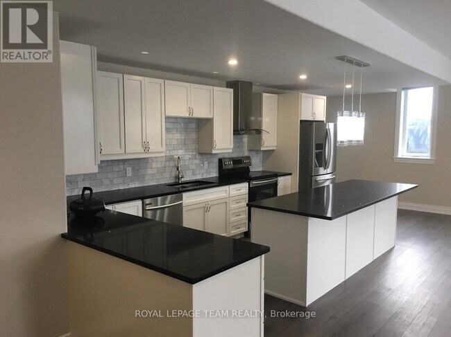 Photo - 1929 River Rd Unité B