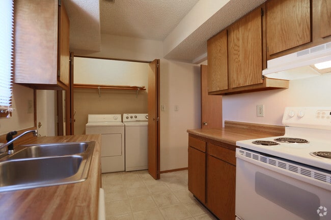 Kitchens are equipped with all major appliances, and washer/dryer are conveniently nearby.