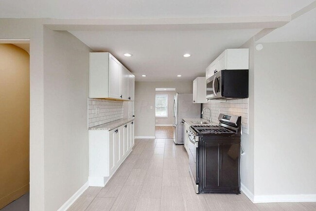 Photo - Half-Off 1st Month’s Rent! | Renovated 2BR Home + Bonus Room