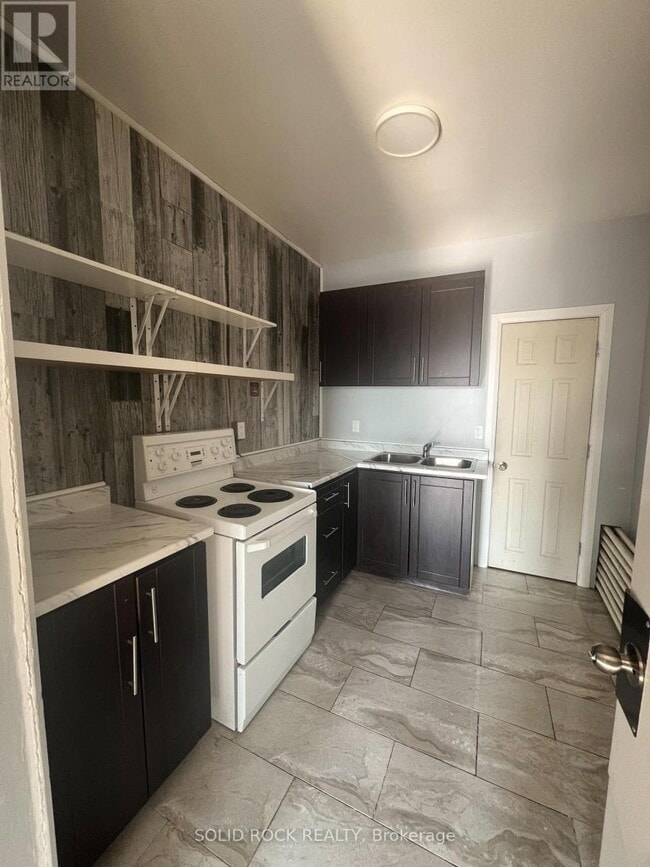 Photo - 89 King St W Unité B4